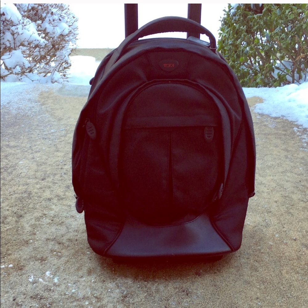 Tumi rolling backpack